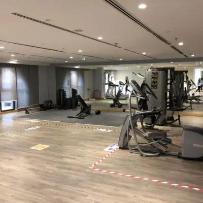 Discover the contemporary gym at Arjan Dubailand, equipped with state-of-the-art fitness gear including treadmills, exercise bikes, weight machines, and free weights. This clean and spacious facility features wall mirrors and floor markers to ensure a safe workout environment. It’s an ideal spot for residents of nearby 1-bedroom apartments looking to stay fit. Promoting an active lifestyle in the heart of Dubai, this amenity is proudly associated with Redlac Real Estate—your trusted partner for finding premium properties in Dubai.