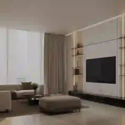 Discover the epitome of modern living with this exquisite room featuring a state-of-the-art flat-screen TV mounted on the wall, complemented by sophisticated shelves. The space boasts a plush L-shaped sofa and a central ottoman, perfect for relaxation. Tall curtains frame expansive windows that provide breathtaking views of Dubai Production City, enhancing the minimalist decor accented by warm lighting. Experience luxury at its finest with Redlac Real Estate in Dubai—your gateway to unparalleled living spaces designed to elevate your lifestyle.