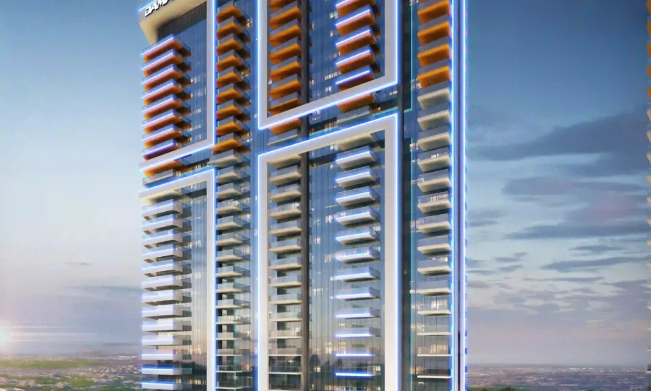 The image showcases Golf Gate 2, a sleek high-rise in Dubai with blue and orange lights set against a dusky sky. It features two towers offering luxurious apartments with breathtaking golf course views. Numerous balconies and a curved entryway enhance its appeal, surrounded by lush trees and pathways. Discover this gem through Redlac Real Estate, your key to elegant living in Dubai’s prime locations!.