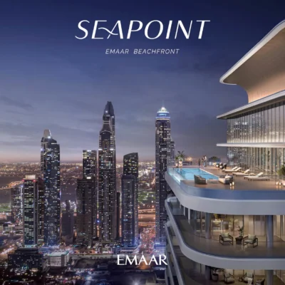 The image showcases a contemporary high-rise building with an opulent balcony that offers breathtaking views of the cityscape at dusk. The skyline is adorned with illuminated skyscrapers and a standout tower, while a QR code is subtly placed on the lower right corner. The elegant text Seapoint Residences Emaar Beachfront appears prominently above. For those seeking premium properties in Dubai, Redlac Real Estate offers an exceptional portfolio, providing you access to stunning residences like these to elevate your lifestyle in one of the worlds most vibrant cities.