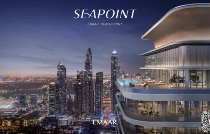 The image showcases a contemporary high-rise building with an opulent balcony that offers breathtaking views of the cityscape at dusk. The skyline is adorned with illuminated skyscrapers and a standout tower, while a QR code is subtly placed on the lower right corner. The elegant text Seapoint Residences Emaar Beachfront appears prominently above. For those seeking premium properties in Dubai, Redlac Real Estate offers an exceptional portfolio, providing you access to stunning residences like these to elevate your lifestyle in one of the worlds most vibrant cities.