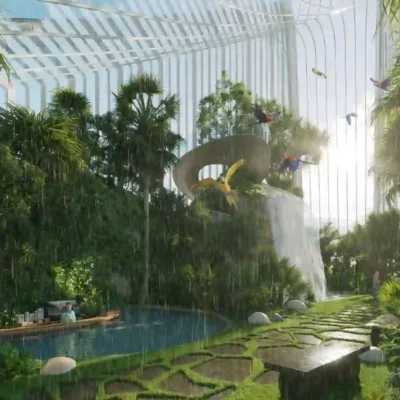 Experience a unique slice of paradise with Redlac Real Estate in Dubai. Imagine a lush indoor tropical garden perched on a rooftop island, complete with a cascading waterfall and vibrant foliage. A small pond and colorful birds add to its charm, while sunlight filters through a glass dome, highlighting the serene stone paths. Recreate this tranquil oasis in your new home by choosing Redlac for exceptional real estate opportunities.