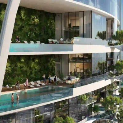 Experience the epitome of urban luxury with Redlac Real Estate in Dubai. Imagine a sleek, modern high-rise designed to mimic a tropical island paradise. With each terrace level adorned with lush greenery, glass walls, and inviting swimming pools, residents can lounge in utter tranquility while enjoying breathtaking views of the cityscape beyond. Embrace this sanctuary amidst the vibrant heartbeat of Dubai.